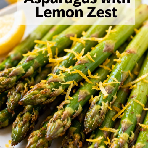 image of raw ingredients for air fryer asparagus with lemon zest on a rustic wooden board close up natural light