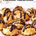 ingredients image of Almond butter unsweetened shredded coconut maple syrup vanilla extract salt and dark chocolate artistically arranged on a rustic wooden table with soft natural lighting high definition focus on ingredients vibrant colors