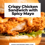 image of realistic and creative image showing all the fresh ingredients for Crispy Chicken Sandwich with Spicy Mayo arranged artfully on a rustic wooden board with a soft natural light
