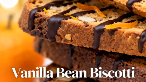ingredients image of a stunning overhead shot of all the ingredients for vanilla bean biscotti dark chocolate orange biscotti arranged artfully on a rustic wooden board capturing the vibrant colors and textures of vanilla beans dark chocolate orange zest almonds flour sugar eggs and baking powder with soft natural lighting and a shallow depth of field