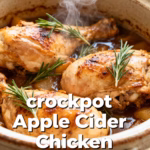image of a plate of cooked crockpot apple cider chicken garnished with fresh herbs next to a bowl of roasted vegetables with a rustic wooden background and soft natural lighting studio photography realistic creative food photography 35mm lens