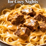 image of ground beef short cut pasta beef broth tomato sauce heavy cream cheese olive oil onion garlic Italian seasoning arranged on white marble kitchen counter with clear glass bowls rustic brown wooden kitchen sets soft diffuse daylight