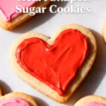 image of flour butter sugar egg vanilla extract baking powder salt almond extract cream cheese sprinkles royal icing buttercream frosting food coloring gluten free flour margarine powdered sugar glaze arranged on a white marble kitchen counter with healthy clear glass bowls and rustic brown wooden kitchen sets under soft diffuse daylight