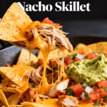 image of Loaded Chicken Nacho Skillet ingredients mise en place shot top down view fresh ingredients on white marble kitchen counter clear glass bowls with boneless skinless chicken breasts tortilla chips shredded cheddar cheese Monterey Jack cheese black beans corn taco seasoning chili powder tomato sauce salsa verde jalapeños pico de gallo guacamole sour cream cilantro green onions rustic brown wooden bowls and utensils soft diffuse daylight realistic food photography