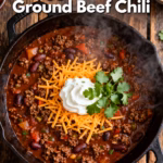 image of top down mise en place shot of ground beef onion bell peppers zucchini corn beans tomatoes garlic chili powder cumin fresh ingredients arranged in clear glass bowls on white marble counter with rustic brown wooden kitchen sets under soft diffuse daylight
