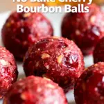 image of bourbon cherries chocolate pecans powdered sugar butter heavy cream vanilla wafers corn syrup arranged on a white marble kitchen counter with clear glass bowls and rustic brown wooden kitchen sets under soft diffuse daylight